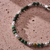 African Turquoise and Howlite sterling silver bracelet styled in a Brunati Como setting