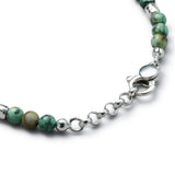 Detail of natural African Turquoise bracelet with organic 925 sterling silver nugget elements