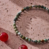 African Turquoise elastic bracelet with sterling silver pebble elements styled in a Brunati Como setting