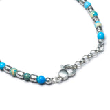 Detail of Aqua Terra Jasper stones arranged in groups of three between sterling silver nuggets