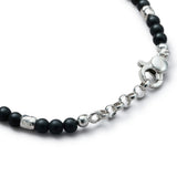 Detail of natural Black Onyx bracelet with organic 925 sterling silver nugget elements