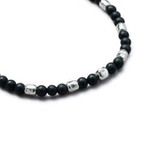 Detail of natural Black Onyx elastic bracelet with organic 925 sterling silver nuggets and BC centre cube