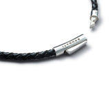 Detail of black braided Italian leather bracelet with BRUNATI 925 Italian sterling silver clasp