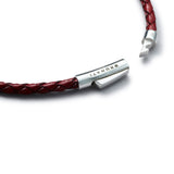 Detail of burgundy braided Italian leather bracelet with BRUNATI 925 Italian sterling silver clasp