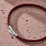 Burgundy braided Italian leather bracelet with 925 sterling silver clasp still life