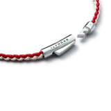 Detail of red and off-white braided organic cotton bracelet with BRUNATI 925 Italian sterling silver clasp