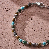 Earth Tones Natural Stone Sterling Silver Pebble Bracelet styled in a refined lifestyle setting