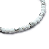 Detail of natural Howlite elastic bracelet with organic 925 sterling silver nuggets and BC centre cube