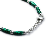 Detail of Japanese malachite-style stone paste discs with organic 925 sterling silver nugget elements