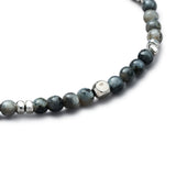 Detail of natural Labradorite elastic bracelet with smooth 925 sterling silver pebble elements and BC centre cube