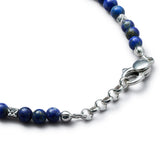 Detail of natural Lapis Lazuli bracelet with diamond-cut 925 sterling silver cubes