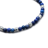 Detail of natural Lapis Lazuli elastic bracelet with organic 925 sterling silver nuggets and BC centre cube