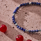 Lapis Lazuli elastic bracelet with sterling silver pebble elements styled in a Brunati Como setting