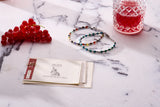 Brunati Como multicolor natural stone and sterling silver nugget bracelet in a styled still life
