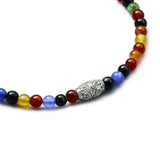 Engraved sterling silver centre element with BC signature and 925 hallmark on multicolor natural stone bracelet