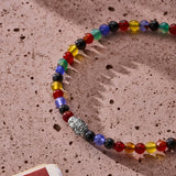 Multicolor natural stone elastic bracelet with engraved sterling silver centre element styled in a Brunati Como setting