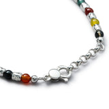 Detail of multicolor natural stone bracelet with organic 925 sterling silver nugget elements