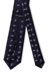 Backside of navy light blue paisley silk jacquard tie in threefold construction.