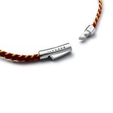 Detail of burgundy and yellow stitched Italian textile bracelet with BRUNATI 925 Italian sterling silver clasp