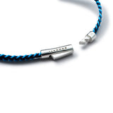 Detail of dark navy and blue stitched Italian textile bracelet with BRUNATI 925 Italian sterling silver clasp