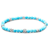 Natural Turquoise elastic bracelet with 925 sterling silver pebble elements and engraved BC centre cube