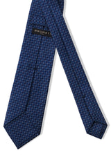 Back view of the navy, blue and white butterfly chains printed silk tie.