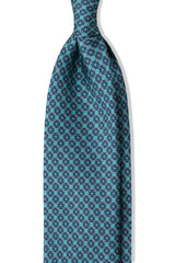 Turquoise, petrol and pink butterfly chains printed silk tie, shown from the front.