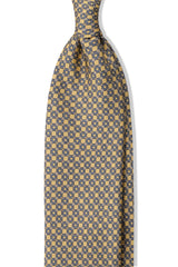 Vanilla, light blue and white butterfly chains printed silk tie, shown from the front.