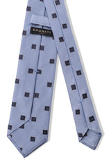 Back view of the light blue and navy geometric square silk jacquard tie.