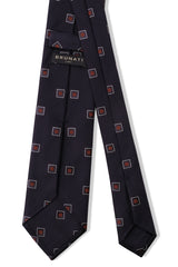 Back view of the navy and red geometric square silk jacquard tie.