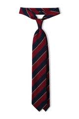 Burgundy, navy and beige striped grenadine shantung silk tie, tied in a knot.