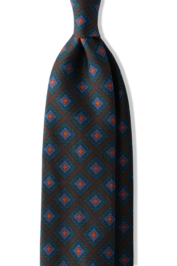 Handprinted Medallion Ancient Madder Silk Tie – Brown / Forest / Light Blue / Orange - Brunati Como