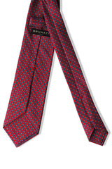 Back view of the red, light blue and white butterfly chains printed silk tie.