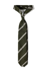 Green and white grenadine shantung silk tie, tied in a knot.