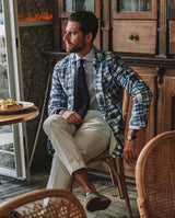 Model wearing the navy plain grenadine shantung silk tie.