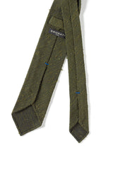 Back view of the olive plain grenadine shantung silk tie with hand-rolled edges.