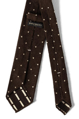 Back view of the brown polka dot shantung silk tie with hand-rolled edges.