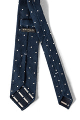 Back view of the navy polka dot shantung silk tie with hand-rolled edges.