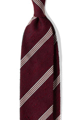 Bordeaux striped grenadine shantung silk tie, shown from the front.
