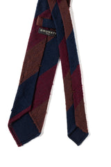 Back view of the bordeaux, navy and brown striped grenadine shantung silk tie with hand-rolled edges.