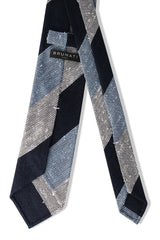 Back view of the navy, white and light blue striped grenadine shantung silk tie with hand-rolled edges.