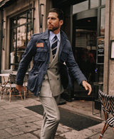 Model wearing the navy and white striped grenadine shantung silk tie.
